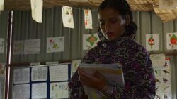 School children in rural Bangladesh learn and recite English with teaching material provided by a healthcare NGO Stock Footage