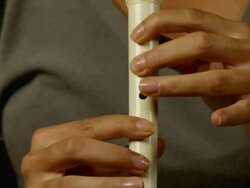 Playing flute Stock Footage