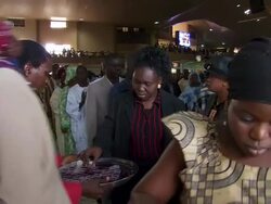MS Shot of people serving drink to congregation in church / Lagos, Nigeria Stock Footage