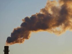 Dark SmokeStack in back lit Stock Footage