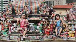 Colorful statues cover the Gopuram of the Sri Mariamman Temple in Singapore. Stock Footage