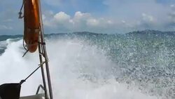Waves on blue sea behind the speed boat water Stock Footage