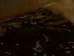 CU of rum being mixed in tank. Stock Footage