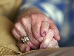 CU Senior couple holding hands / Washington State, USA Stock Footage