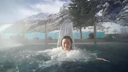 Young Asia woman enjoy hot spring in Switzerland Stock Footage