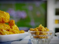 BUFFALO CHICKEN WINGS AND FOOTBALL Stock Footage