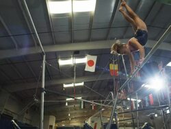 WS Girl (12-13) performing gymnastics on the high bar / Lindon, Utah, USA. Stock Footage