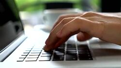 Closeup On Woman's Hand Typing On A Laptop Keyboard Stock Footage
