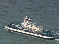 MS AERIAL TS ZI Shot of Hatteras inlet and ferries / North Carolina, United States Stock Footage