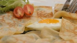 eating spinach pie with sauce close up Stock Footage