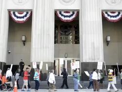 Protesters march outside Detroit bankruptcy court Stock Footage