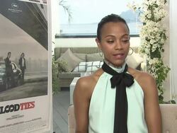 INTERVIEW - Zoe Saldana on how it was like working with Guillaume Canet, comparing him to JJ Abrams at 'Blood Ties' Interview at Palais des Festivals on May 21, 2013 in Cannes, France. (Footage by WireImage Video/Getty Images) Stock Footage