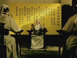 A Chinese professor reading aloud and teaching his students.  Stock Footage