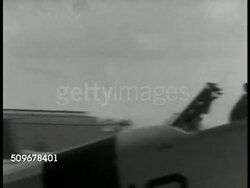 Pilots with goggles and gear in class Instructional Video