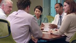 Multi-Ethnic Medical Professionals Meet in Office - MS Stock Footage