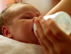 Newborn Baby eating Stock Footage