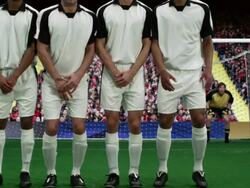 Football going past defensive wall and into goal Stock Footage