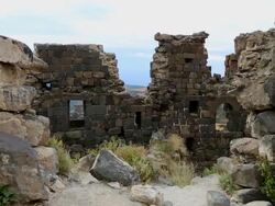 Amberd castle, interior view of the castle, and the Vahramashen church in the buckground Stock Footage