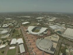 Aerial shot of Stadium Australia and Sydney Olympic Park, NSW, Australia Stock Footage