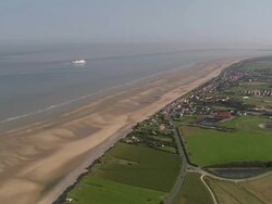 AERIAL, Town along beach, Sangatte, Pas de Calais, France Stock Footage