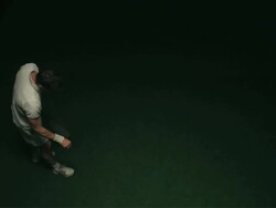 SLO MO WS HA Studio shot of man serving tennis ball Stock Footage