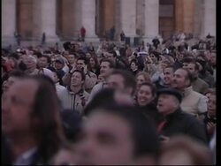 Black smoke signals no decision on new pope, pilgrims in square react News Clip