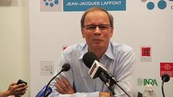 French economist Jean Tirole gives news briefing after winning the Nobel Prize for economics News Clip