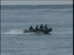 People grieve as search continues for plane crash victims'' bodies News Clip