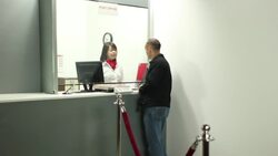 Post office - Customer &amp; assistant, Wide shot Stock Footage