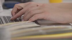 Woman designer typing on laptop Stock Footage