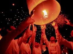 HD:Young people release floating lanterns to the sky. Stock Footage