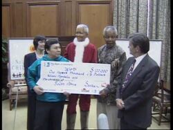 SOUTH AFRICA: CHILDREN VOTE NELSON MANDELA 'SANTA OF THE YEAR' News Clip