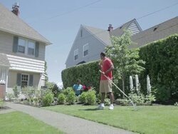 WS Man and woman rking in back yard  / Portland, Oregon, United States  Stock Footage