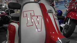Red and White Classic Vintage Lambretta Scooter News Clip