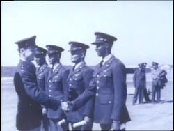 African Americans receive their wings as they join the Tuskegee Airmen's 99th Fighter Squadron. News Clip