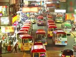HD:Crowd bus on the road at night in Hongkong.(Timelapse) Stock Footage
