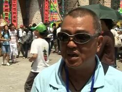 VOICED: Hong Kong bun festival goes ahead despite fears over swine flu News Clip