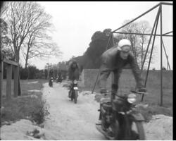 HOME FOR THE ""REDCAPS"" News Clip