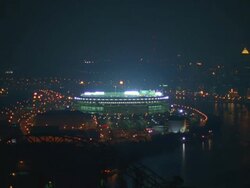 WS PAN View of stadium and city skyline near river / Pennsylvania, United States Stock Footage