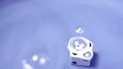 Slow Motion of Playing Dice in Water Stock Footage
