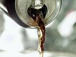 Cola can being poured Stock Footage