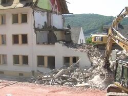 MS Demolition of apartment block / Saarburg, Rhineland-Palatinate, Germany Stock Footage