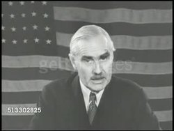 1942: WARNING US: WS State Department, Navy & War building w/ Winged Victory statue FG. MS Diplomat Joseph Grew (1880-1965) sitting w/ American flag BG, SOT knows the Japanese, their military, methods of warfare, '...happen here if we loose this war. Instructional Video