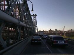 A limousine crosses Brooklyn Bridge in New York City. Stock Footage
