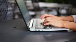 Typing on a laptop Stock Footage