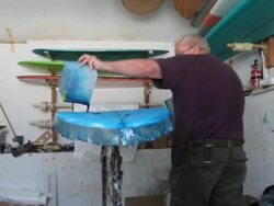 "Craftsman fabricates new surfboard in shop, using resin" Stock Footage