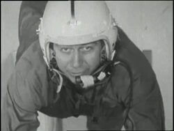 A man floats in the Vomit Comet airplane during a zero gravity test. News Clip