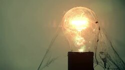 Exploding light bulb & cobweb Stock Footage