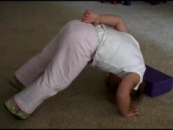 Baby, Infant, Toddler Does Yoga (Downward Dog Position) Stock Footage