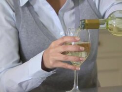 Young woman drinking wine Stock Footage